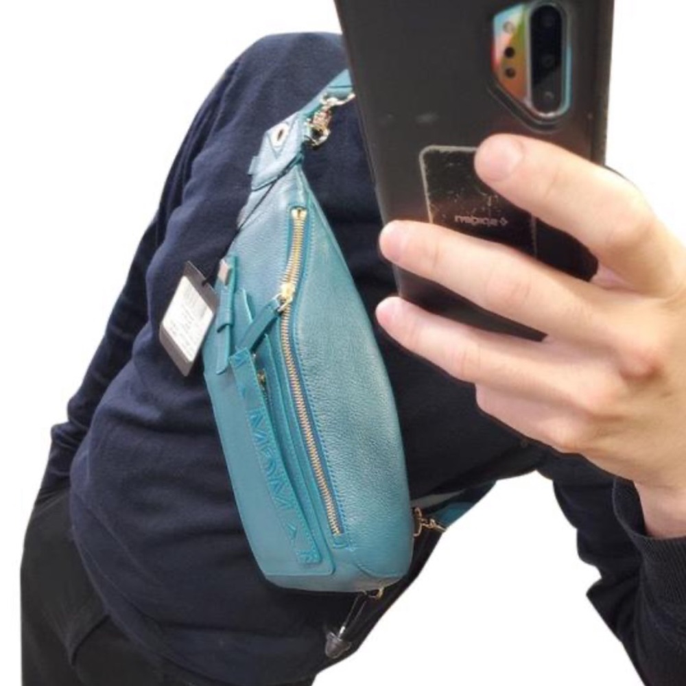 MCM Unisex’s Milano backpack / crossbody bag